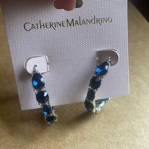 Silver C hoops with blue stones